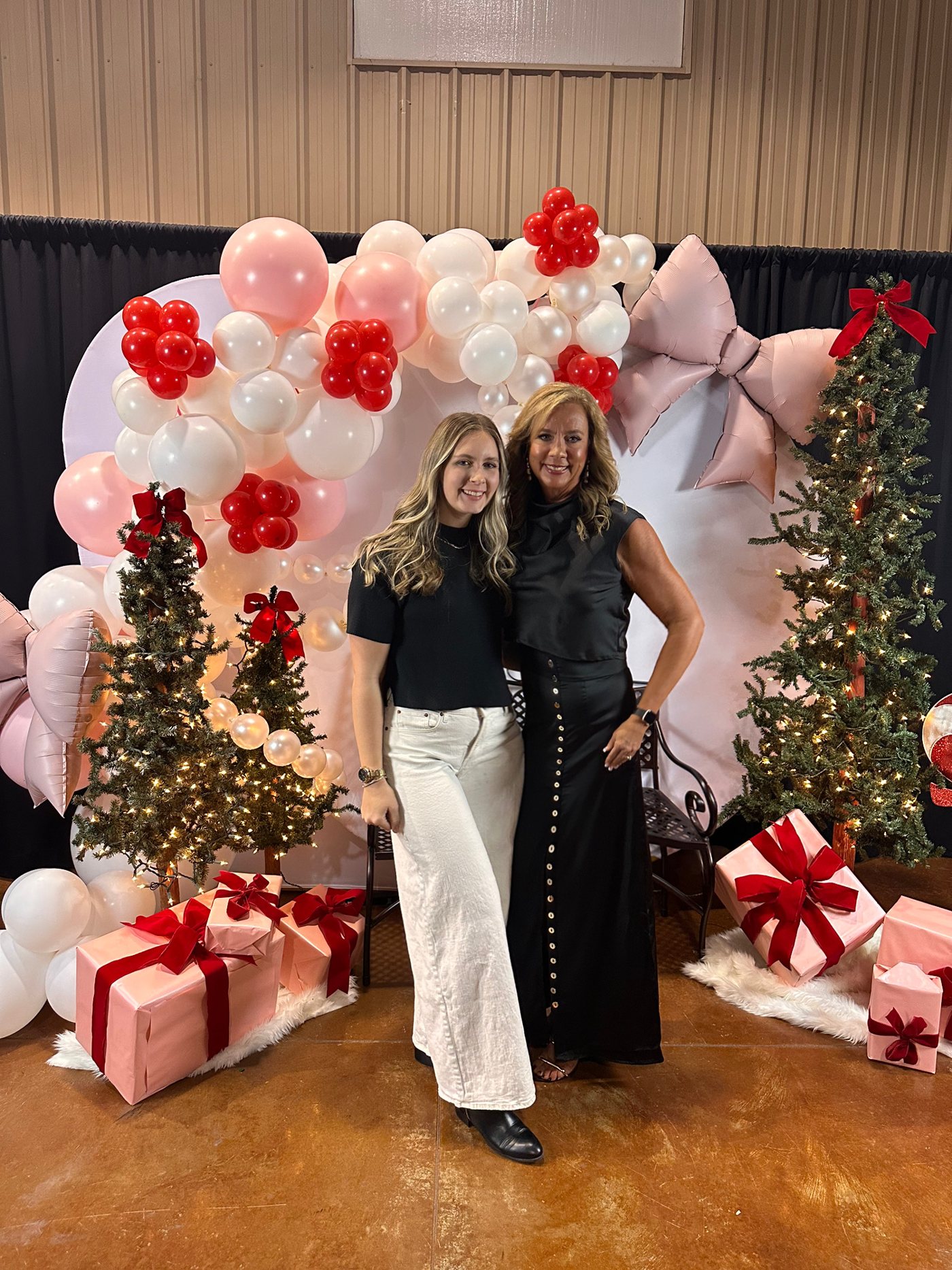Danielle and Sadie at the photo backdrop